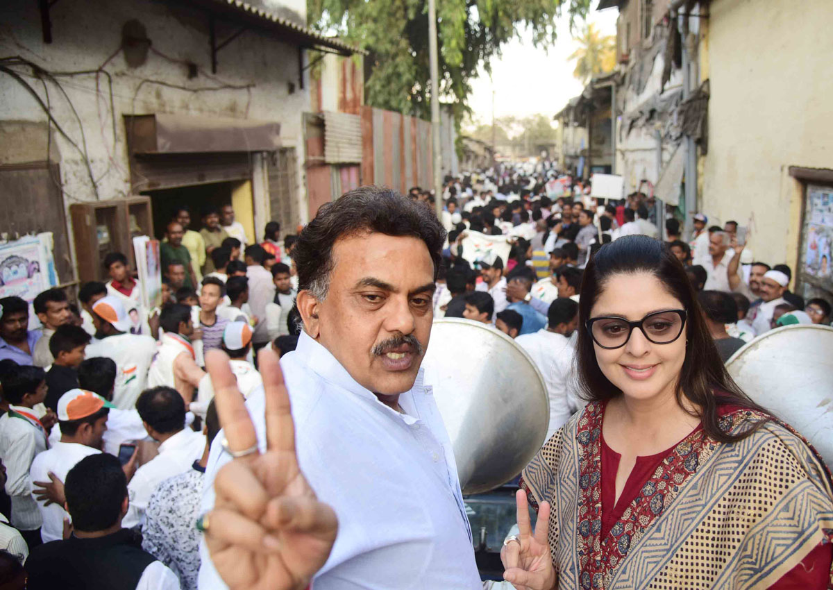 MRCC President Sanjay Nirupam & Cine Star Nagma during Road Show at Anushakti Nagar Chitta Camp .