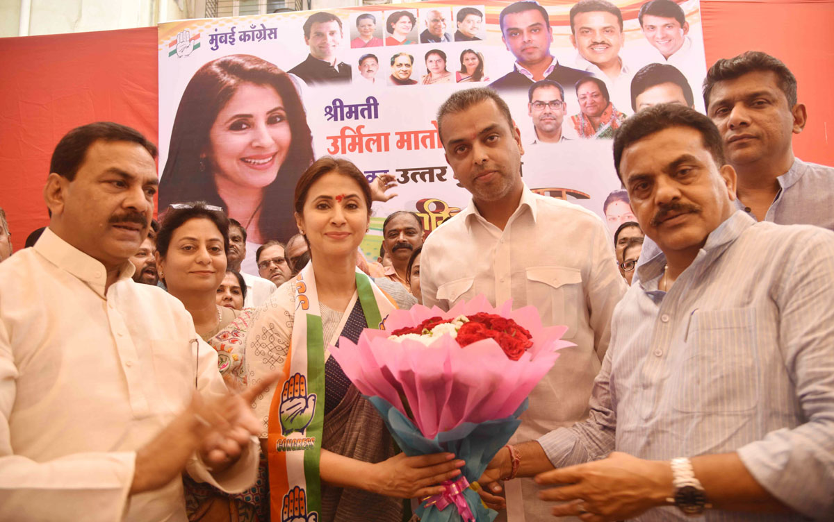 Mumbai Congress President Milind Deora with Urmila Matondkar at Borivali.