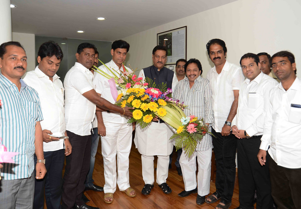 Kokan Congress Leader Sandesh Parker meets Chief Minister Prithviraj Chavan at Varsha Bunglow.