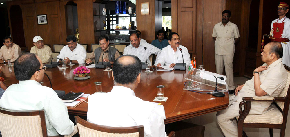 Govener of Maharastra K. Shankarnarayanan (2nd from right) reciews memorandum from Mumbai BJP Public representatives regarding the hike and irregularities in the power tariff from Reliance Infra (energy) and Tata Power in Mumbai at Raj Bhavan.