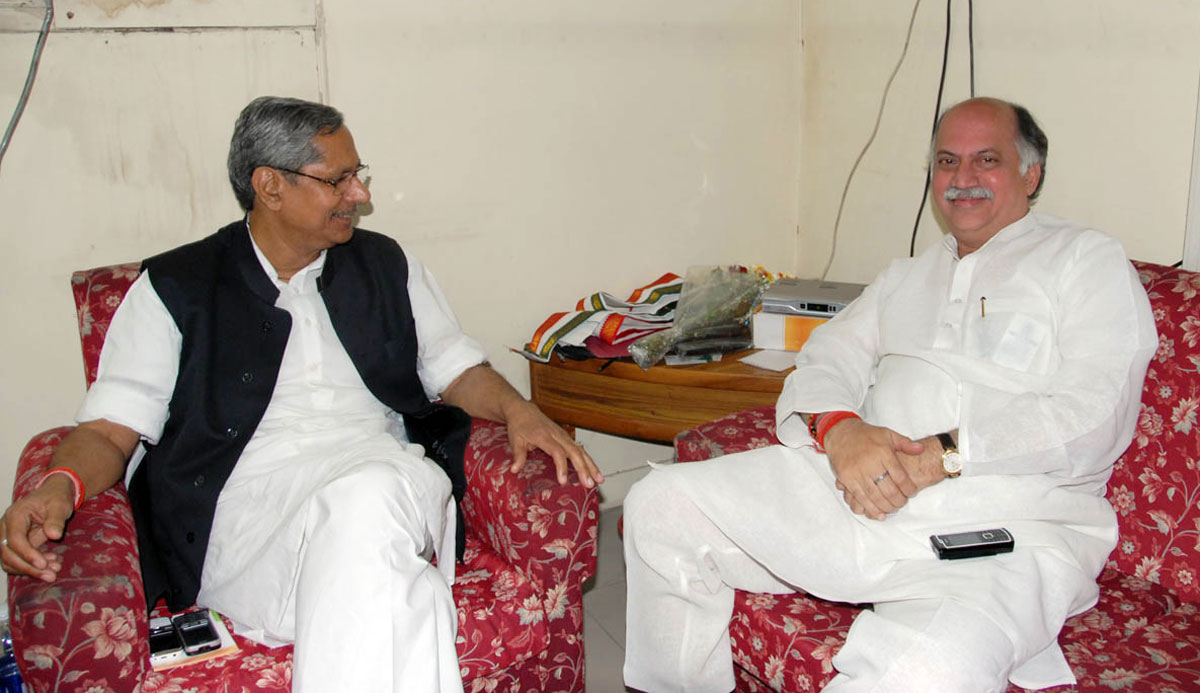 Union Minister Of State For Home, Telecommunications, Post And IT Gurudas Kamat Met Newly Appointed AICC. In Charge For Maharashtra Mohan Prakash At Congress HQ 24 Akbar Road in New Delhi.