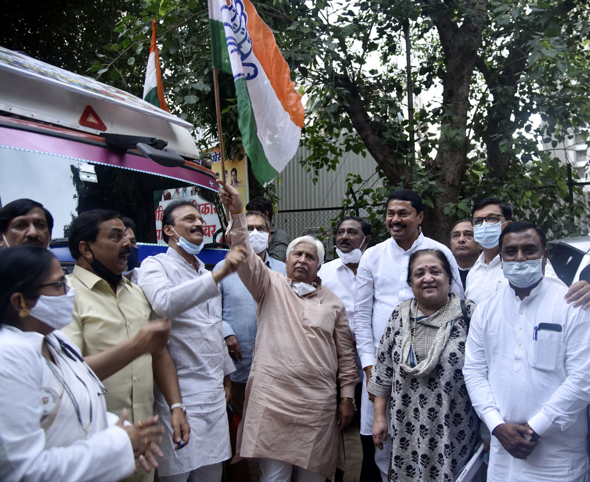 Mumbai Congress Organised Flood Relief Fund Helping Hand to Kokan Flood affected area Peoples the commodities Trucks were Flag off by MPCC observer H.K.Patil at Tilak Bhavan.