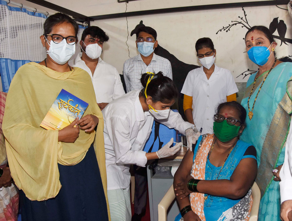 Minister Varshatai Gaikwad & MP Rahul Shewale during inauguration of Covid-19 Vaccination Center at Sion.