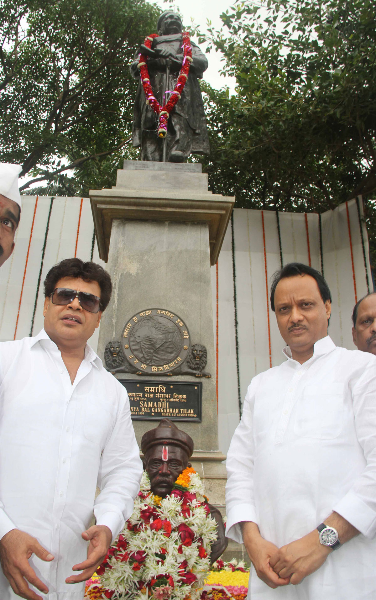 DY. CHIEF MINISTER AJIT PAWAR PAYING TRIBUTE TO LATE LOKMANYA BAL GANGADHAR TILAK ON HIS DEATH ANNIVERSARY AT GIRGAON CHOWPATI.
