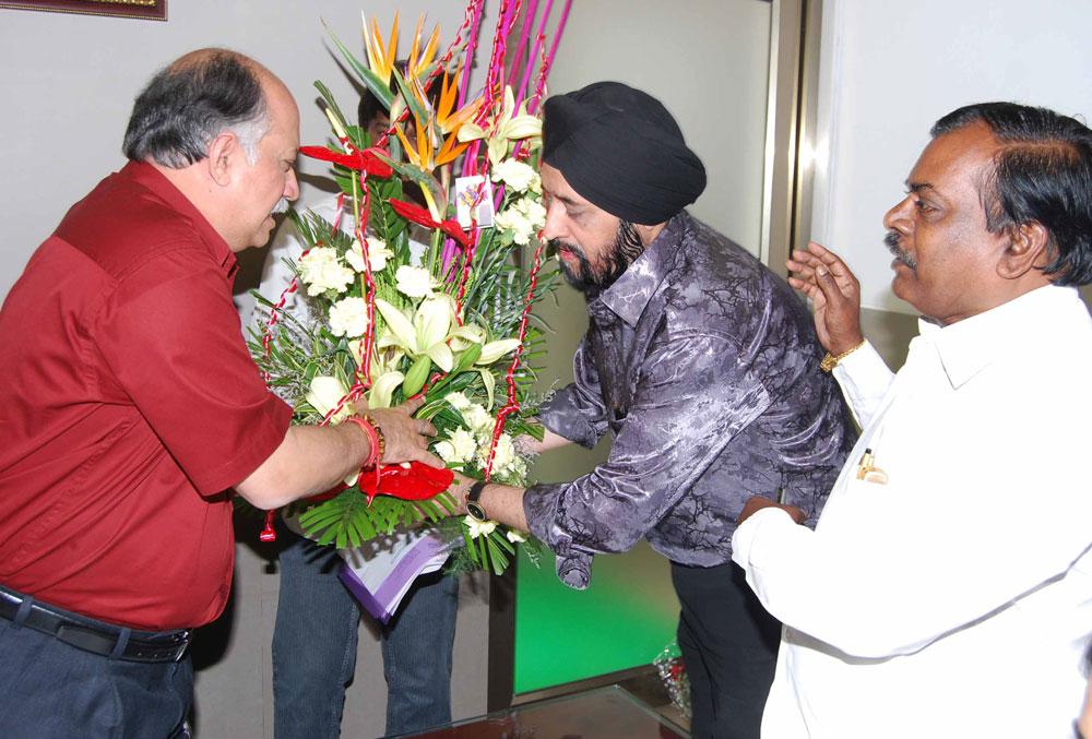UNION MINSTER OF STATE HOME & TELE COMMUNICATIONS AND IT SHRI.GURUDAS KAMAT AT ANDHERI D.N.NAGAR OFFICE.