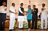 CHIEF MINISTER PRITHVIRAJ CHAVAN & UNION MINISTER OF SOCIAL JUSTICE MUKUL WASNIK DISTRIBUTES DR BABASAHEB NATIONALMERIT AWARD AT Y B CHAVAN HALL MUMBAI.