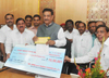MLA MADHU CHAVAN PRESENTED A CHEQUE OF Rs.15,50,001.TO CHIEF MINISTER RELIFE FUND AT VIDHAN BHAVAN.