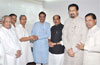 AICC MAHARASHTRA OBSERVER MOHAN PRAKASHJI CONGRATULATING CHIEF MINISTER PRITHVIRAJ CHAVAN ON HIS UNANIMOUS ELECTION TO THE COUNCIL AT VARSHA BUNGALOW.