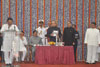 CABINET  MINISTER SURESH SHETTY  TOOK OATH AT RAJBHAVAN MUMBAI .
