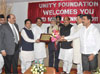 UNION MINISTER VILASRAO DESHMUKH FELICITATING DR.SAYYED AHMED GOVERNOR OF JHARKHAN IN MUMBAI.