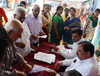 Ex.MLA Madhu Chavan during Signature Campaign to Protest against Hike Rates of Electricity Bill.