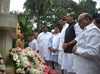 LEADER'S PAYING TRIBUTE TO "KRANTI STAMBHA" ON THE OCCASION "KRANTI DIN" AT GOWALIA TANK AUGUST KRANTI MAIDAN IN MUMBAI.