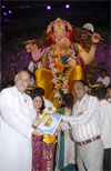 M.P. & EX.UNION MINISTER GURUDAS KAMAT WITH WIFE SMT.MARUKH KAMAT AT LALBAUGH RAJA DARSHAN ON OCCASION GANPATI FESTIVAL IN MUMBAI.