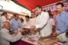 South Mumbai Congress Party Ex.Union Minister Milind Deora during Free Umbrella Distribution to Senior Citizens also Felicitation of SSC HSC Topper Students by Mobile Gifts at Tardeo. South Mumbai Congress Party Ex.Union Minister Milind Deora during Free Umbrella Distribution to Senior Citizens also Felicitation of SSC HSC Topper Students by Mobile Gifts at Tardeo.