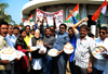 Mumbai Congress & Youth Congress Protest against BJP Govt." Acche Din" by Distributing "Dal Packets" Near Jogeshwari Station.